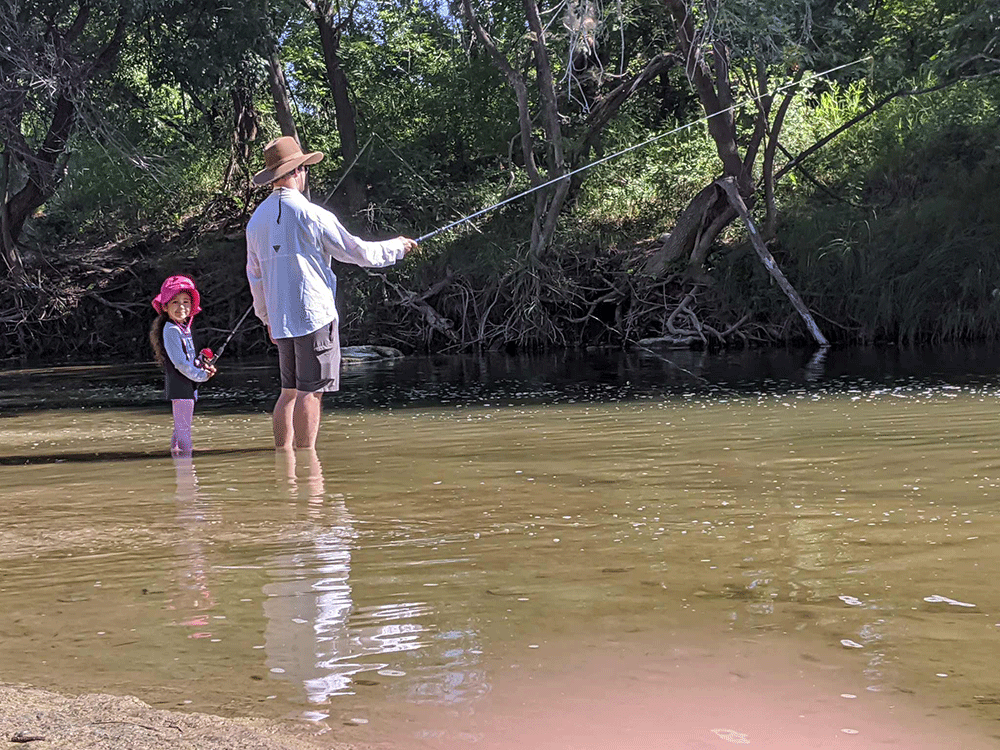 Dr. Morton Baker fishing with his daughter